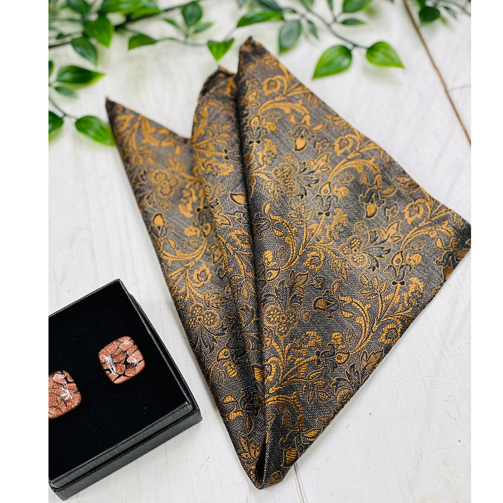 Harmaa taskuliina oranssilla kuviolla ⎪ Giorgio Redaelli