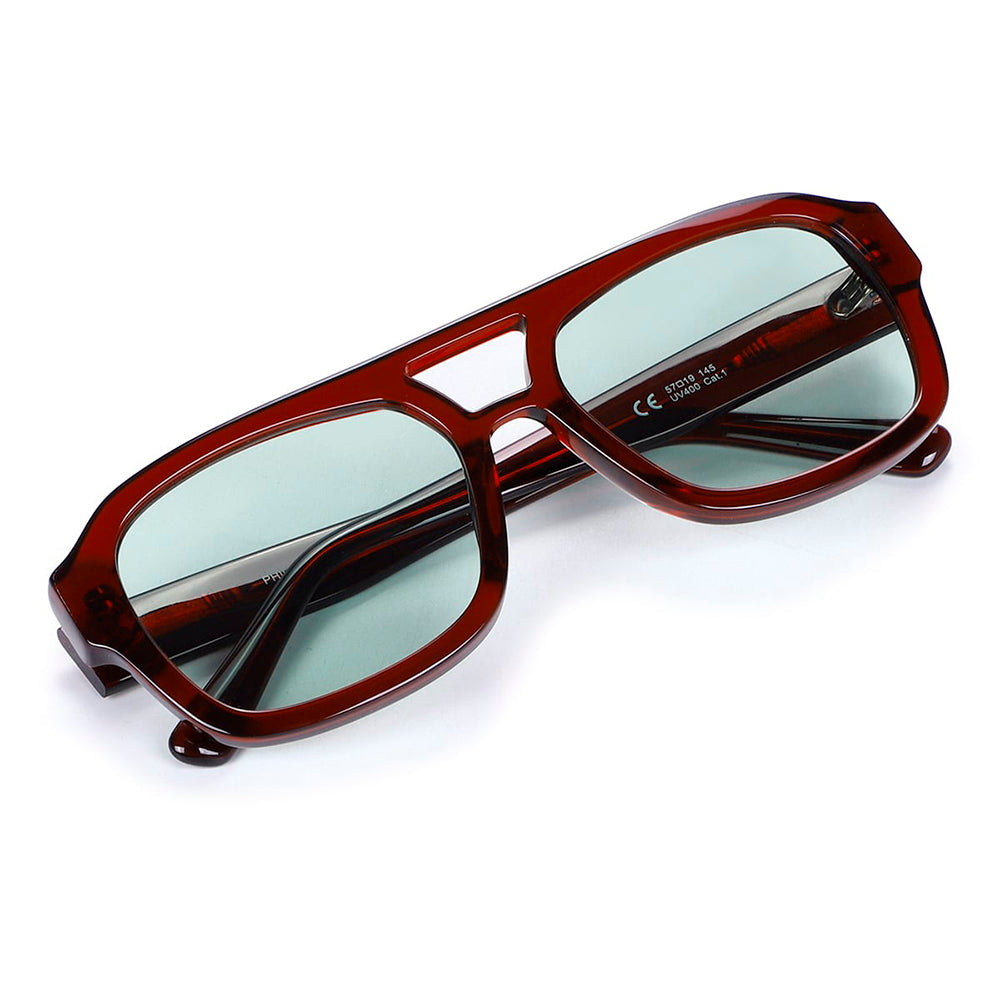 Dark red sunglasses with a greenish lens | Phil | JohNocera