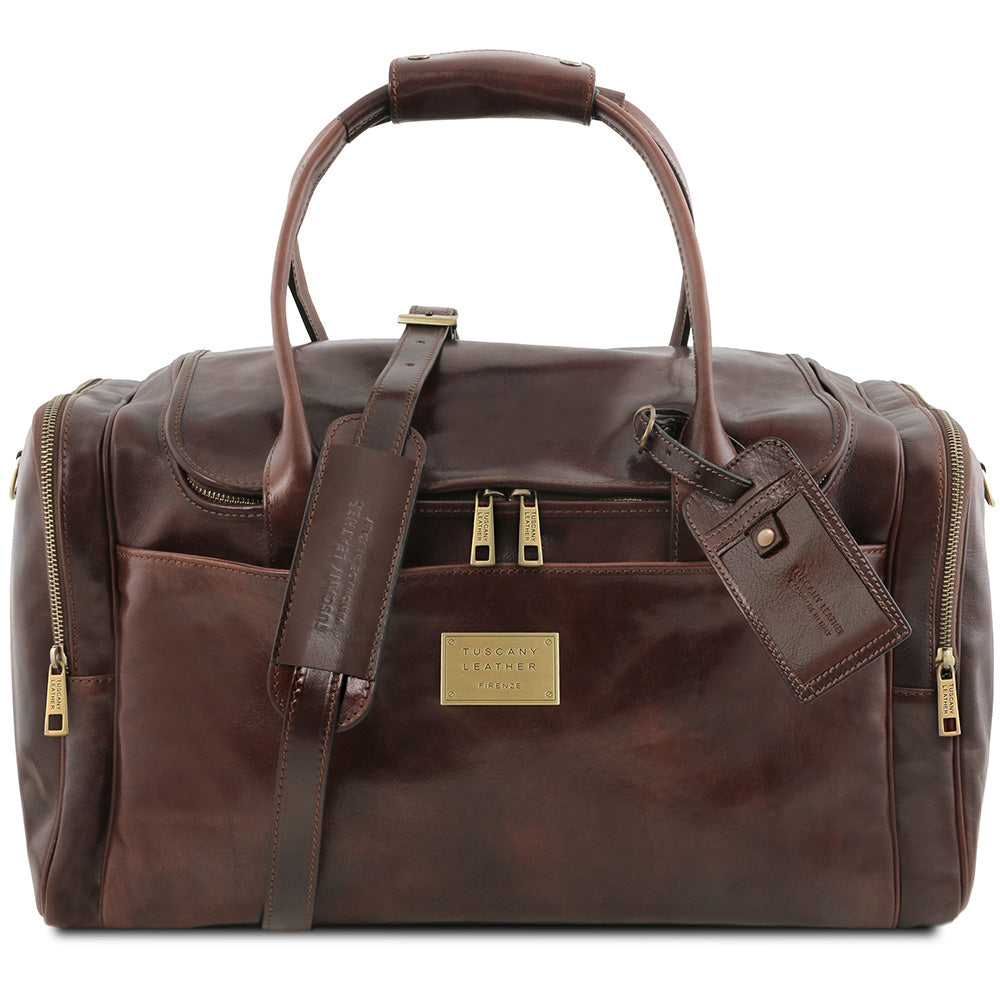 Dark brown leather bag with side pockets⎪ TL