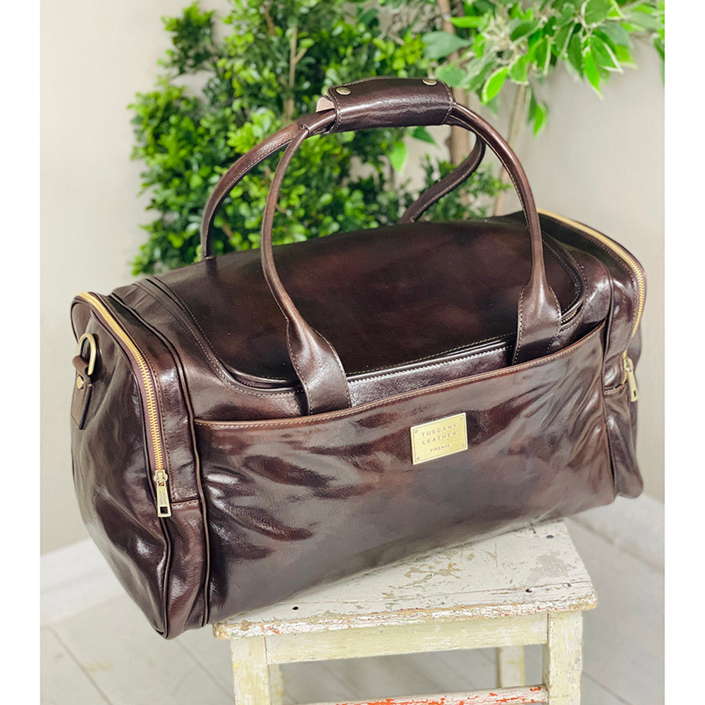 Dark brown leather bag with side pockets⎪ TL