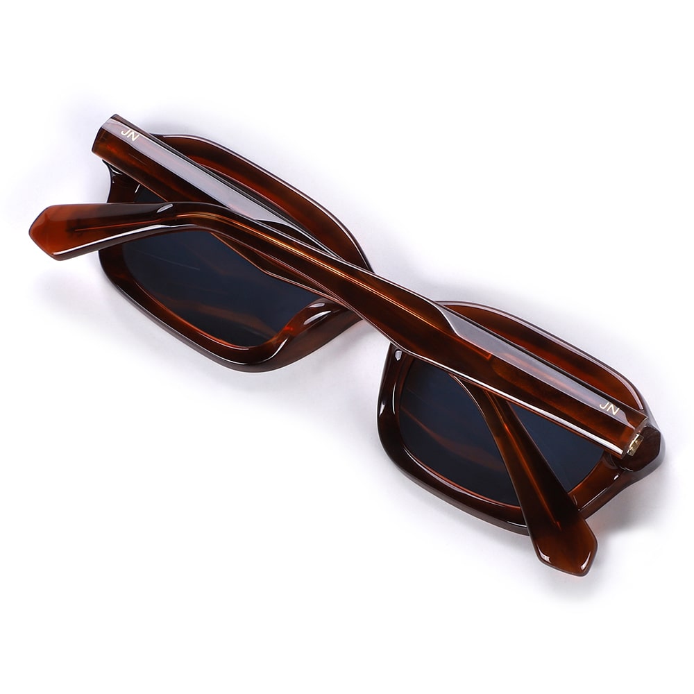 Reddish-brown sunglasses with a blue lens⎪ Luna Blue⎪ JohNocera