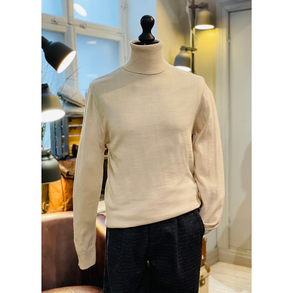 Brown cable knit sweater with a turtleneck⎪ Circus Donati Fausto