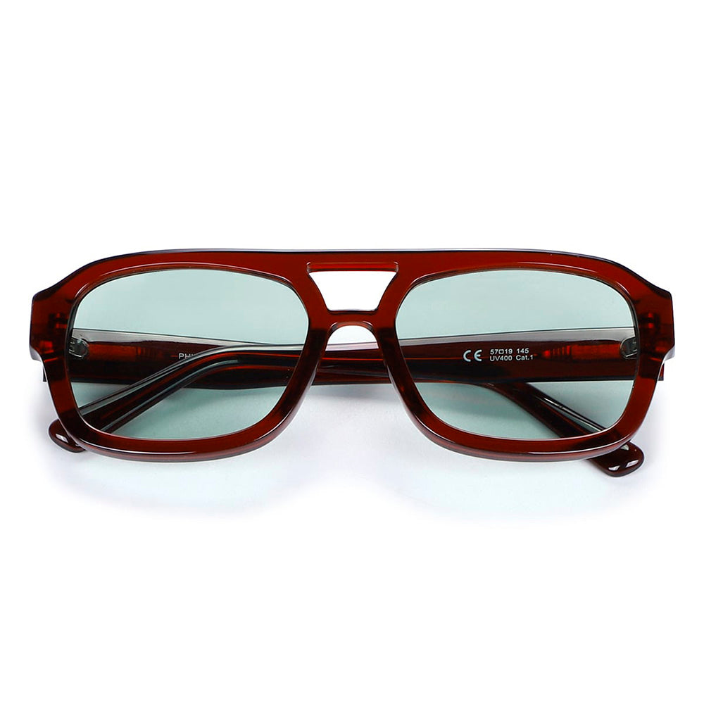 Dark red sunglasses with a greenish lens | Phil | JohNocera