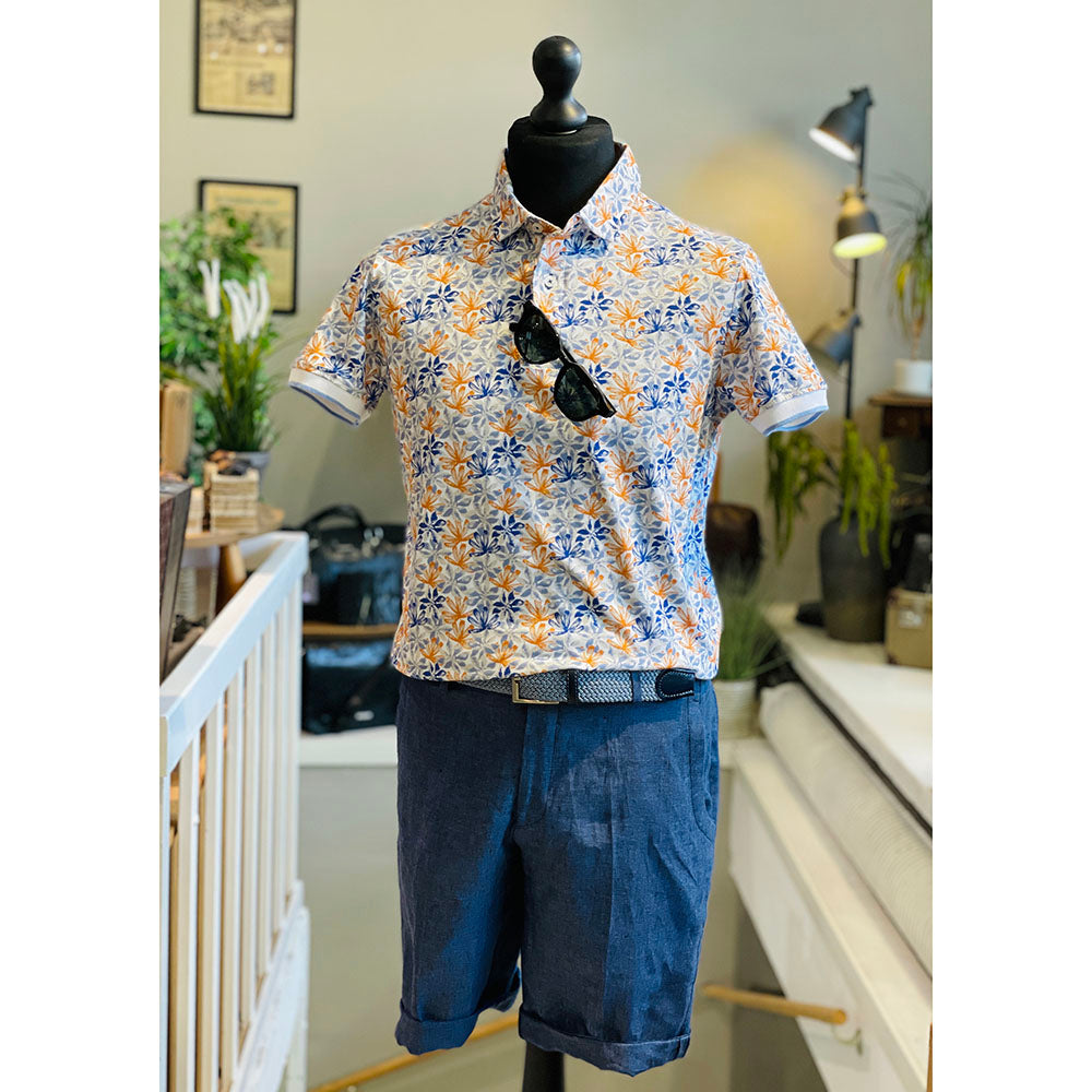 Weißes Poloshirt mit türkisfarbenem Muster ⎪ Pattern ⎪ Yellow Skin